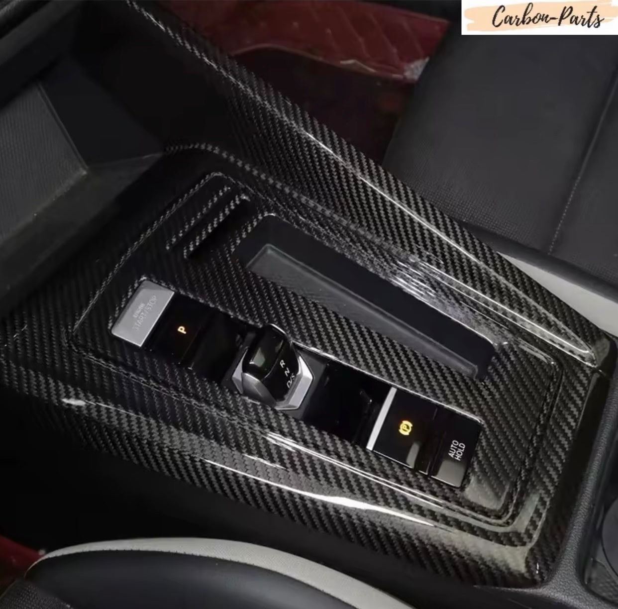 Echt Carbon Mittelkonsolen-Abdeckung passend für Volkswagen Golf 8 GTI Edition 50 sowie alle weiteren Golf 8 Modelle.