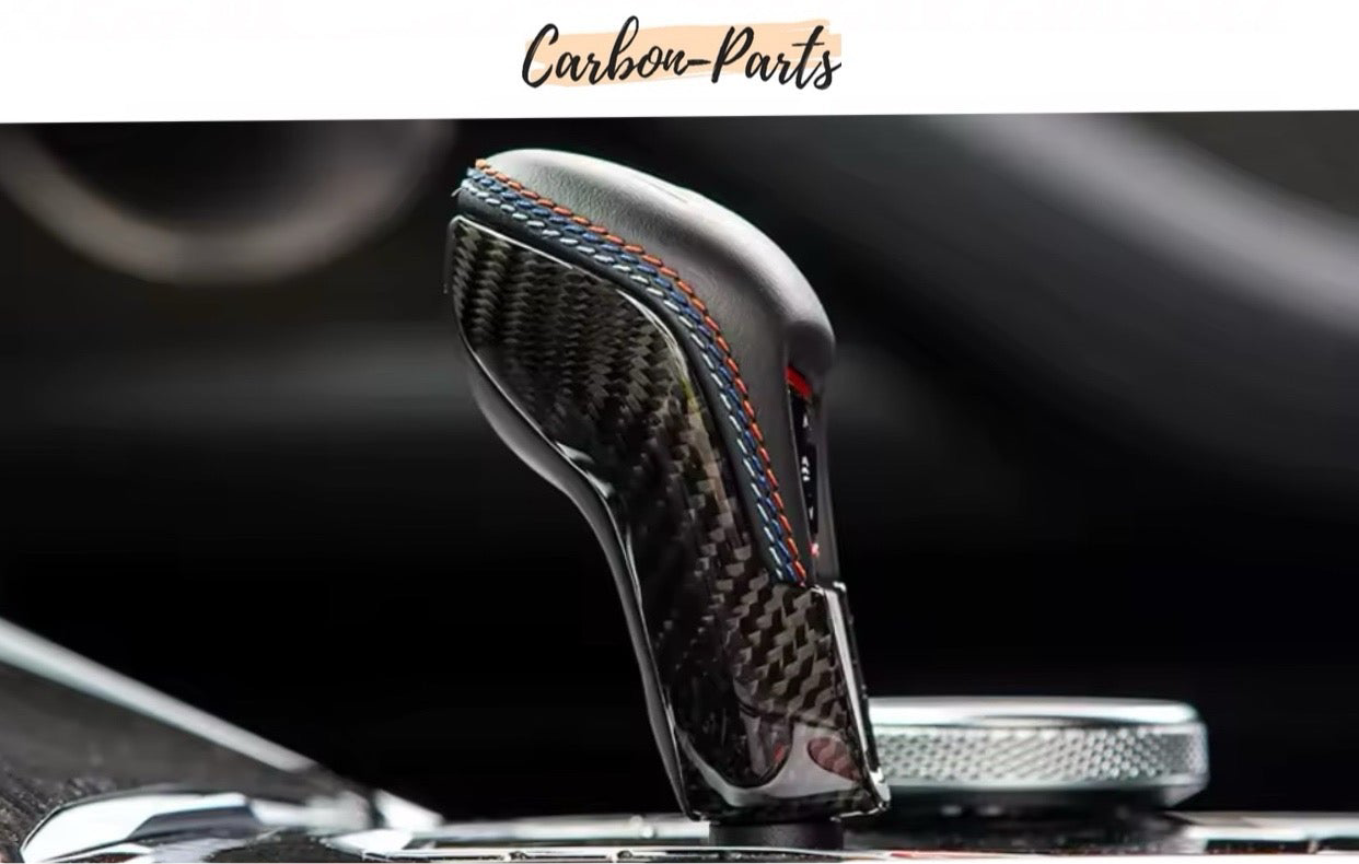 Sportliche M-Power Optik durch Echt-Carbon Wählhebel-Abdeckung.