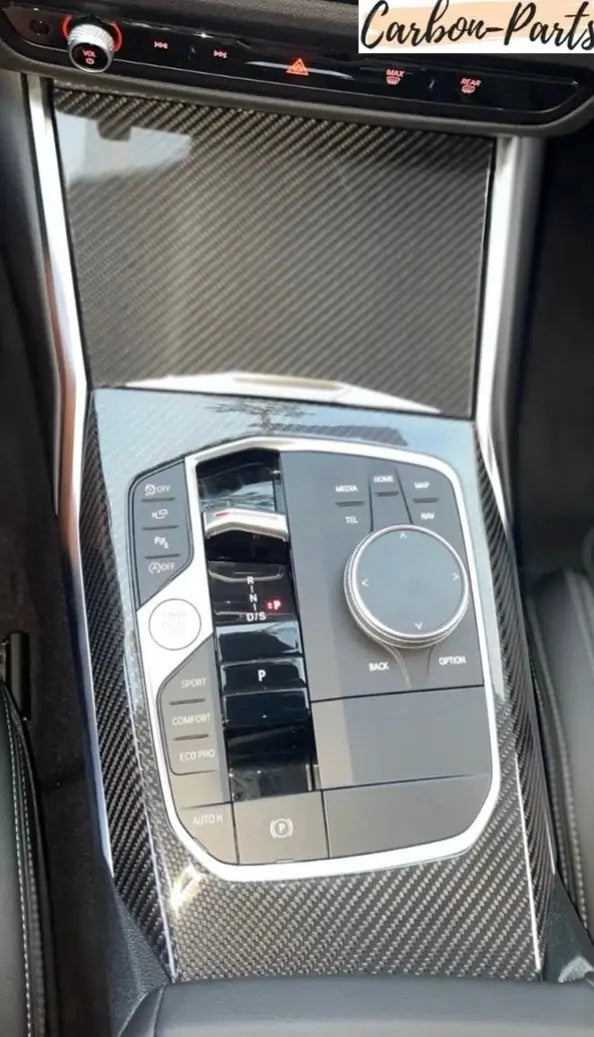 Millimetergenaue Passform der Carbon-Abdeckung für das BMW iDrive Bedienelement.