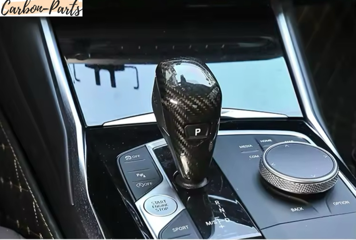 Optischer Vergleich: Standard BMW Schalthebel vs. Echt-Carbon Upgrade.